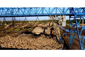 Medição de nível com chave de pá rotativa em sistema de transporte de cavacos de madeira